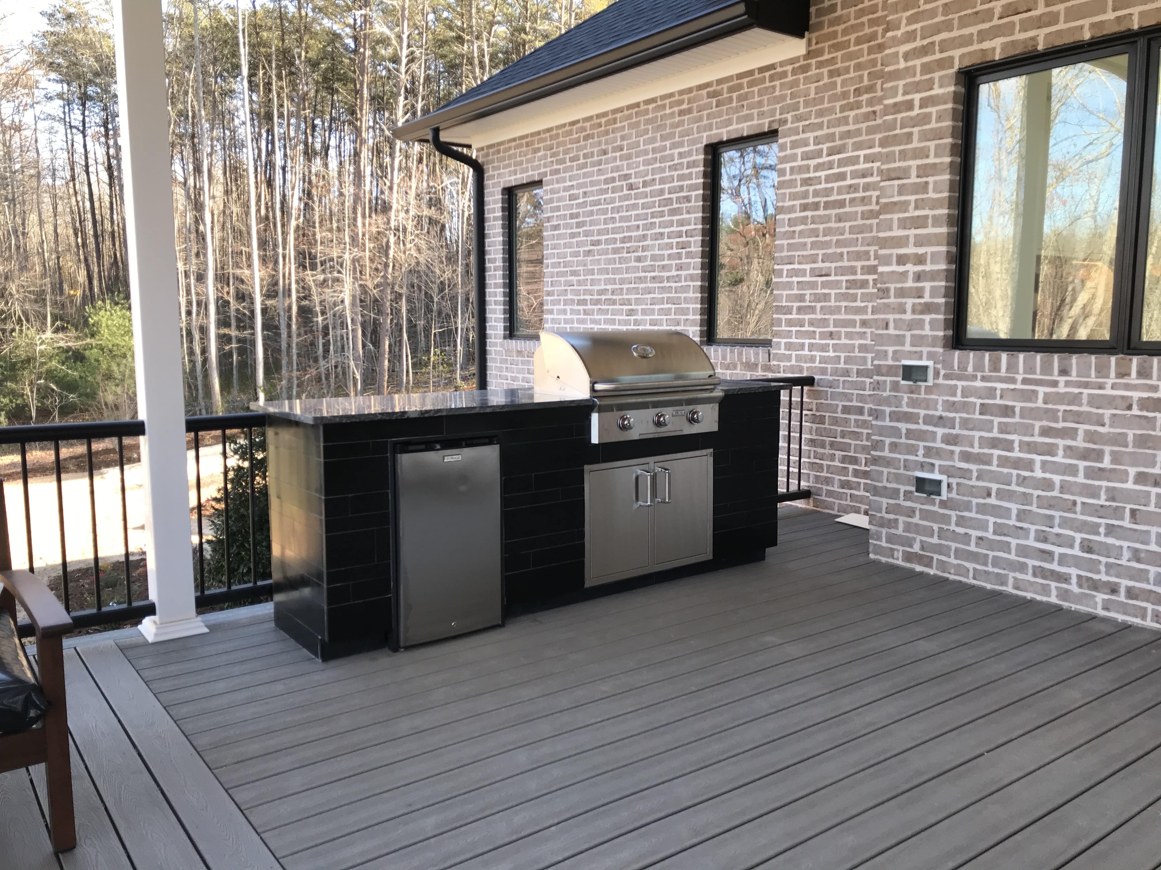 Ebony Planc Large Format Tile used to clad the exterior of a residential outdoor kitchen project
